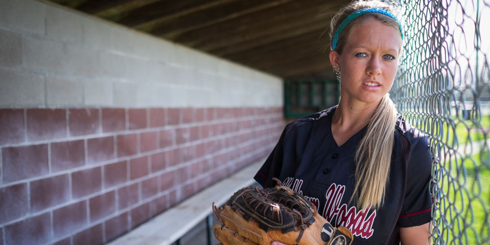 Shelby LeCuru in softball uniform